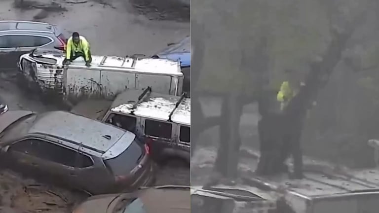 Un hombre se aferra a un camión que trepa a un árbol para salvarse de las graves inundaciones en Santiago, Chile